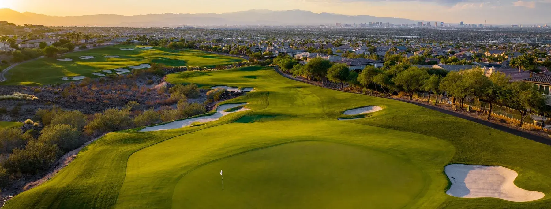 Luxury home community in Henderson, NV overlooking golf course and Las Vegas skyline