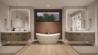 Primary bathroom with a freestanding soaking tub between two floating vanities